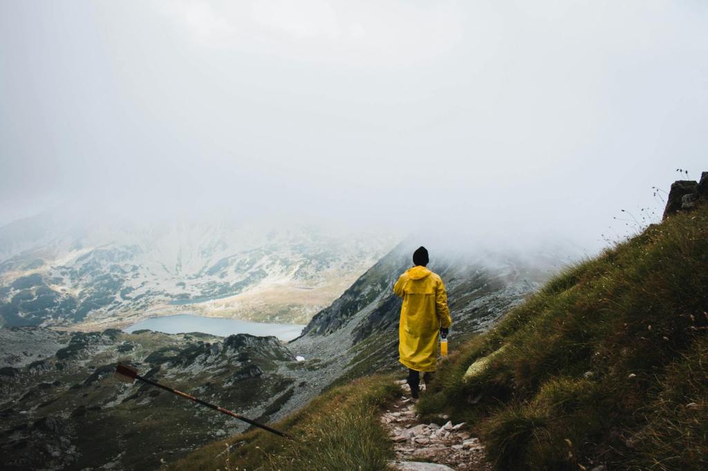 outdoor adventure man in yellow raincoat